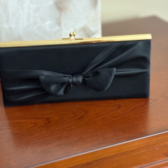Handbags - Black satin with gold tone hardware.